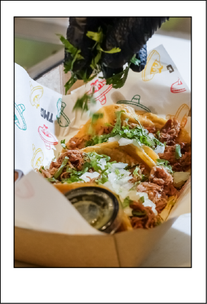 Group of friends enjoying tacos
